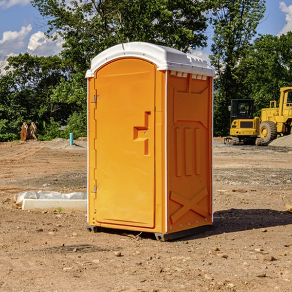 how often are the porta potties cleaned and serviced during a rental period in Reid